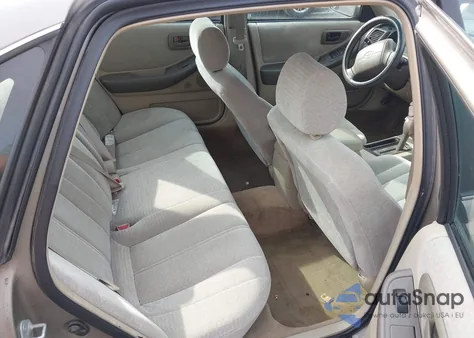 1998 Toyota Avalon Xl z USA, uszkodzony, nr VIN 4T1BF18B9WU270585